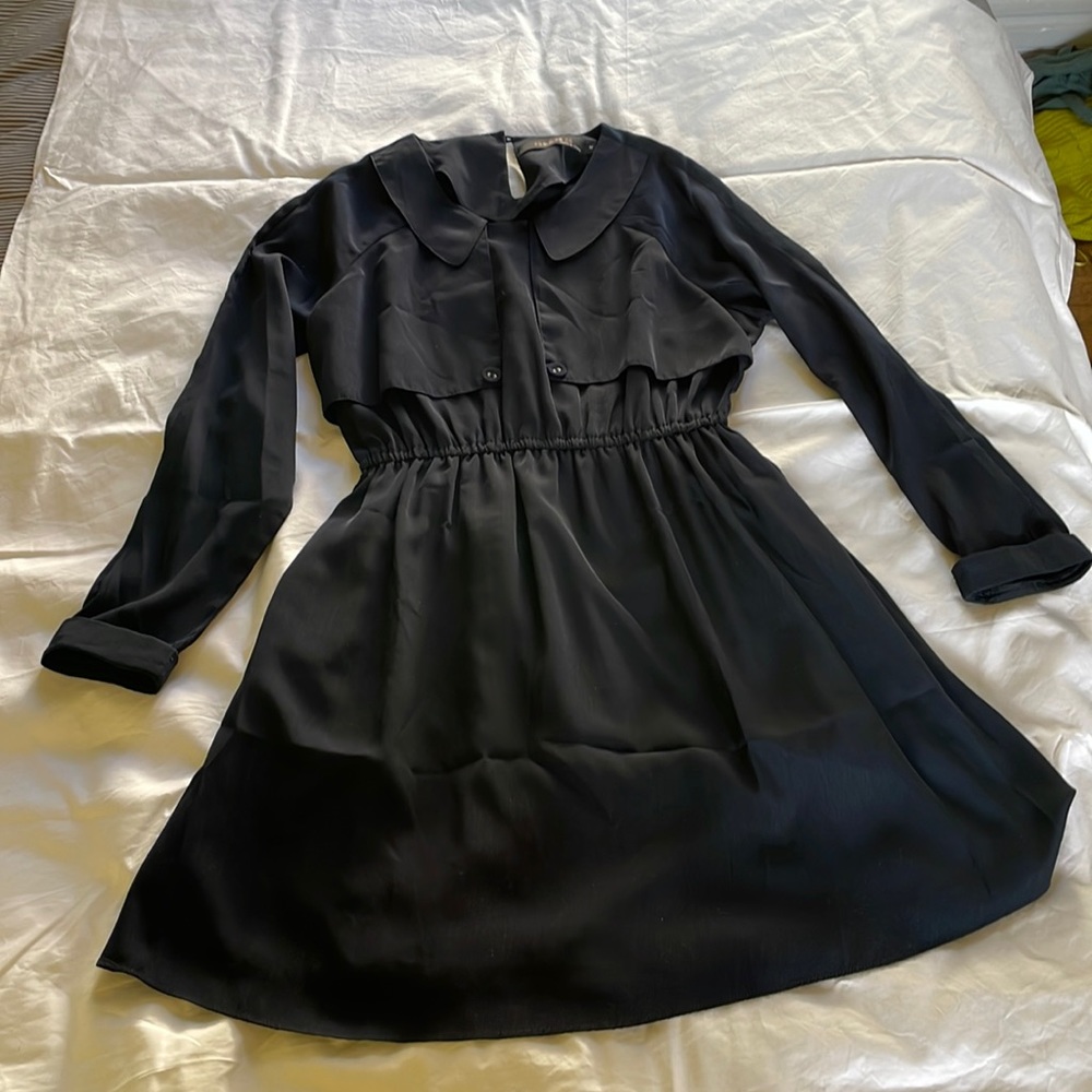 Navy blue sailor-style dress.